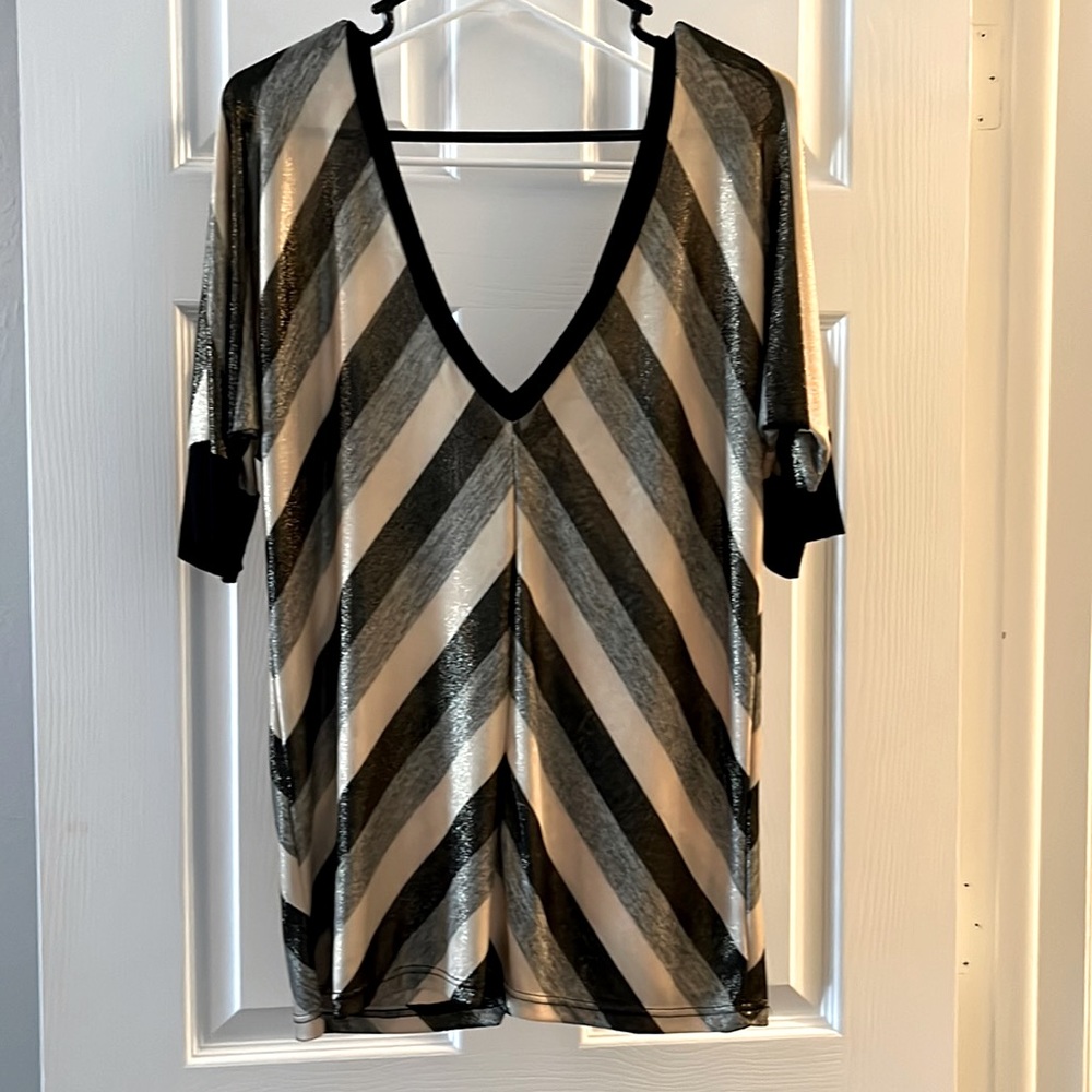 BKE Boutique shimmering deep V-Neck. Black and tan. Size medium.
